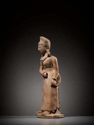 Lot 216 - A MAGNIFICENT AND VERY LARGE TERRACOTTA FIGURE OF A STANDING BEAUTY, MAJAPAHIT PERIOD