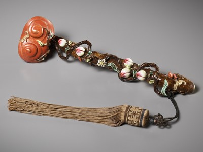 Lot 121 - A FAMILLE ROSE PORCELAIN ‘LINGZHI’ RUYI SCEPTER, MID-QING DYNASTY