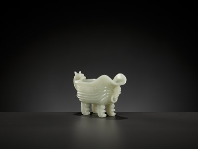 Lot 52 - A PALE CELADON JADE POURING VESSEL, YI, QING DYNASTY