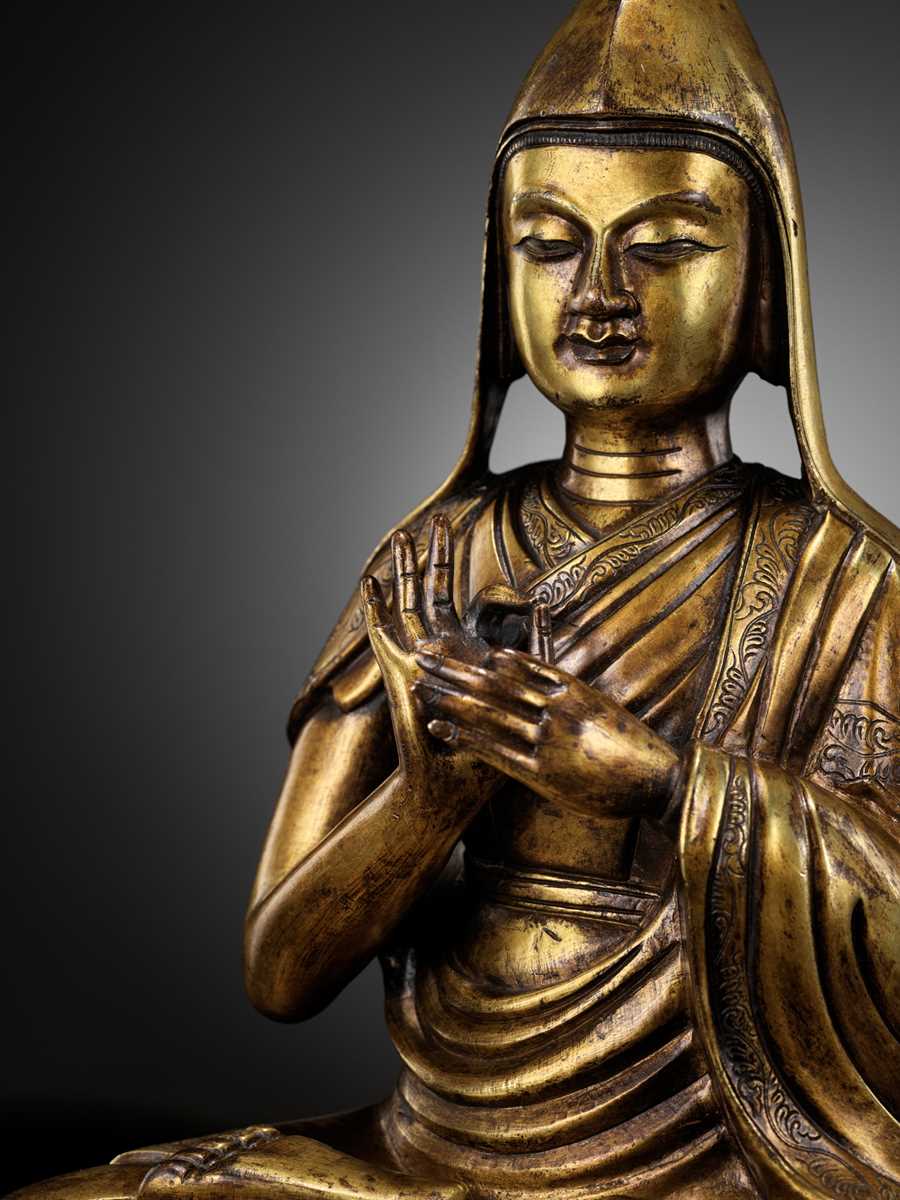 Lot 175 - A LARGE GILT BRONZE FIGURE OF TSONGKHAPA, 17TH-18TH CENTURY