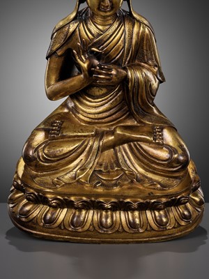 Lot 175 - A LARGE GILT BRONZE FIGURE OF TSONGKHAPA, 17TH-18TH CENTURY