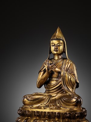 Lot 175 - A LARGE GILT BRONZE FIGURE OF TSONGKHAPA, 17TH-18TH CENTURY