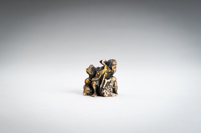 Lot 1462 - A WALRUS TUSK NETSUKE OF GAMA SENNIN