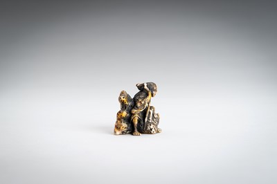 Lot 1462 - A WALRUS TUSK NETSUKE OF GAMA SENNIN