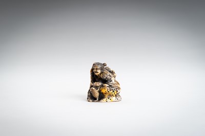 Lot 1462 - A WALRUS TUSK NETSUKE OF GAMA SENNIN