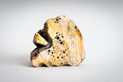 Lot 1462 - A WALRUS TUSK NETSUKE OF GAMA SENNIN