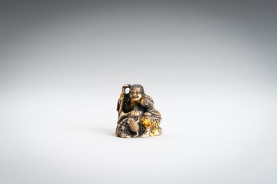 Lot 1462 - A WALRUS TUSK NETSUKE OF GAMA SENNIN