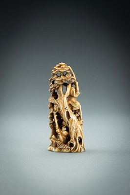 Lot 718 - AN IVORY NETSUKE-OKIMONO OF SEVERAL TENGU IN A FIGHT, MEIJI