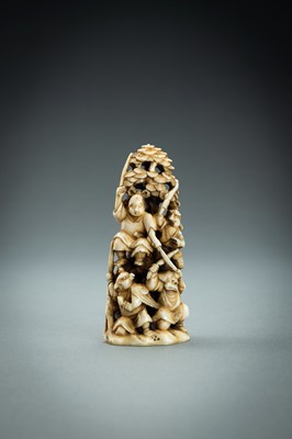 Lot 718 - AN IVORY NETSUKE-OKIMONO OF SEVERAL TENGU IN A FIGHT, MEIJI