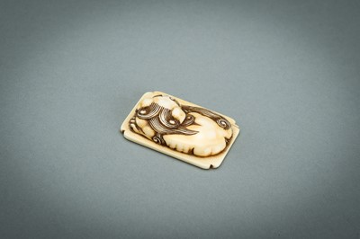 Lot 312 - A RENSAI STYLE IVORY NETSUKE OF A SHISHI, MEIJI