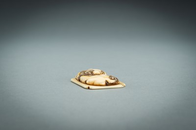 Lot 312 - A RENSAI STYLE IVORY NETSUKE OF A SHISHI, MEIJI