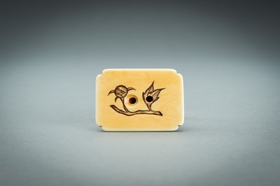 Lot 312 - A RENSAI STYLE IVORY NETSUKE OF A SHISHI, MEIJI