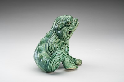 Lot 592 - A RARE GREEN GLAZED POTTERY FIGURE OF THE THREE-LEGED TOAD