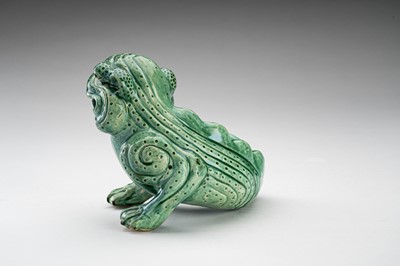 Lot 592 - A RARE GREEN GLAZED POTTERY FIGURE OF THE THREE-LEGED TOAD