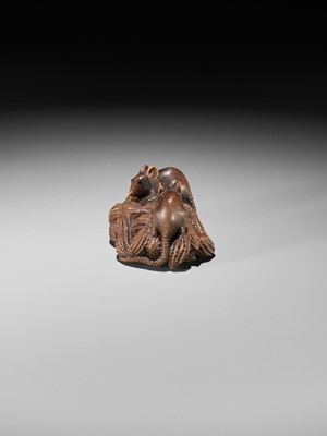 Lot 89 - MASANAO: A WOOD NETSUKE OF TWO RATS ON A CLUSTER OF PEANUTS