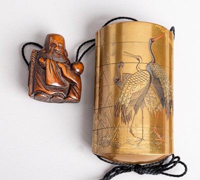 Lot 488 - KOMA KYUHAKU: A GOLD LACQUER FIVE-CASE INRO WITH A WOOD NETSUKE