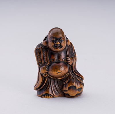 Lot 643 - A MITSUHIRO-STYLE WOOD NETSUKE OF HOTEI