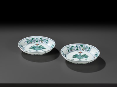 Lot 103 - A RARE PAIR OF DOUCAI ‘POMEGRANATE AND FOLIAGE’ DISHES, YONGZHENG MARKS AND PERIOD