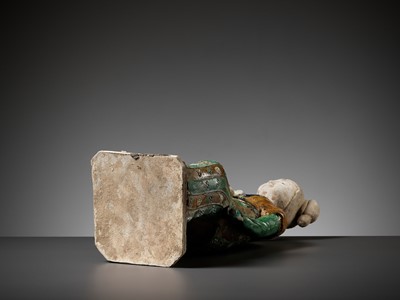Lot 1192 - A RARE SANCAI-GLAZED POTTERY FIGURE OF A SEATED COURT LADY, TANG DYNASTY OR LATER