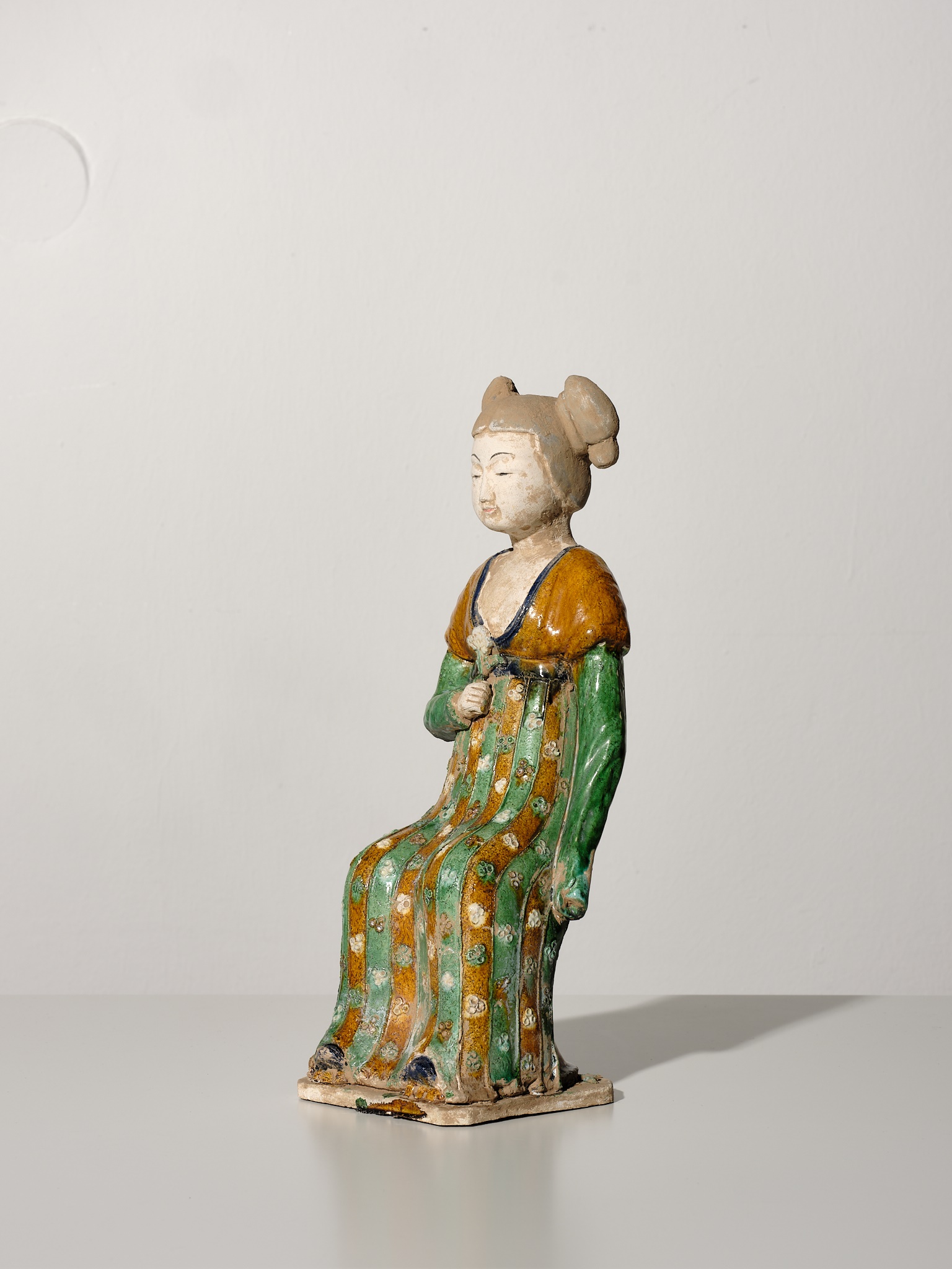 Lot 1192 - A RARE SANCAI-GLAZED POTTERY FIGURE OF A