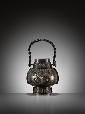 Lot 137 - A GOLD AND SILVER-INLAID BRONZE ARCHAISTIC WINE VESSEL, YOU, 17TH-18TH CENTURY