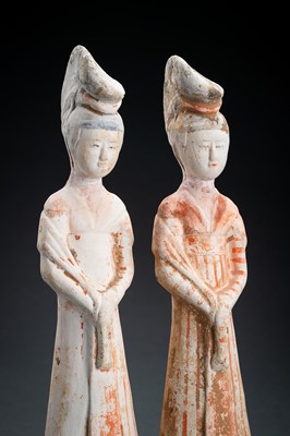 Lot 302 - A PAIR OF PAINTED TANG DYNASTY POTTERY COURT LADIES