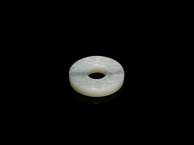 Lot 337 - AN ARCHAISTIC WHITE AND GRAY JADE DISC, BI, 18TH - EARLY 19TH CENTURY