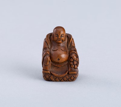 Lot 693 - A TINY BOXWOOD CARVING OF HOTEI, MEIJI