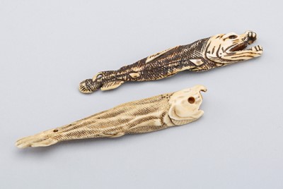 Lot 742 - A LOT WITH TWO IVORY NETSUKE OF DRIED FISH, EDO