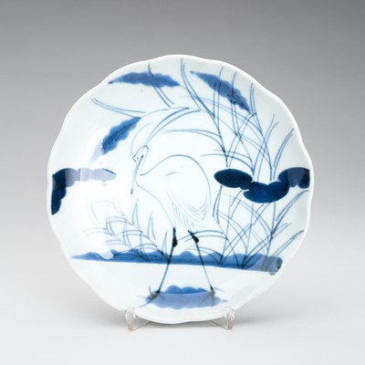 Lot 1209 - A BLUE AND WHITE PORCELAIN DISH WITH A CRANE, MEIJI