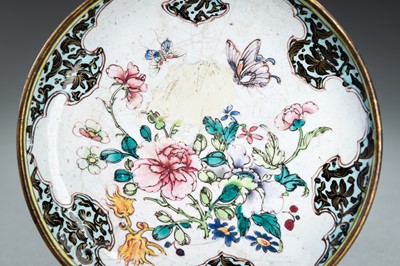 Lot 10 - A CANTON ENAMEL ‘FLOWERS AND BUTTERFLIES’ DISH, QING