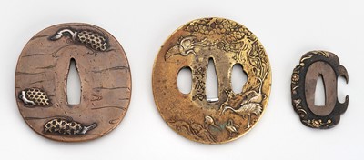 Lot 1368 - A LOT WITH THREE COPPER AND BRASS TSUBA, 19th CENTURY