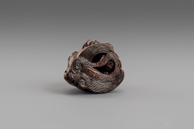 Lot 307 - MASATOMO: A BOXWOOD NETSUKE OF A SHISHI LION, EDO PERIOD