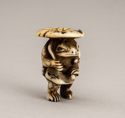 Lot 759 - HARUOKI: A STAG ANTLER NETSUKE OF A FROG DRESSED AS A SAMURAI