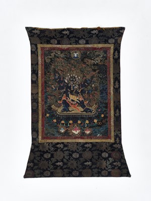 Lot 533 - A BLACK-GROUND THANGKA DEPICTING VAJRAKILA