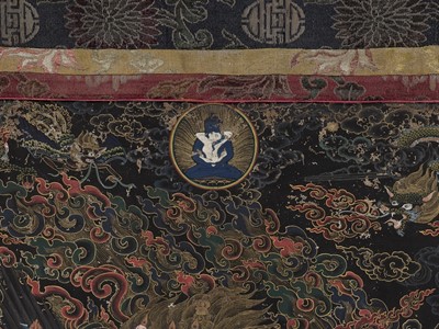 Lot 533 - A BLACK-GROUND THANGKA DEPICTING VAJRAKILA