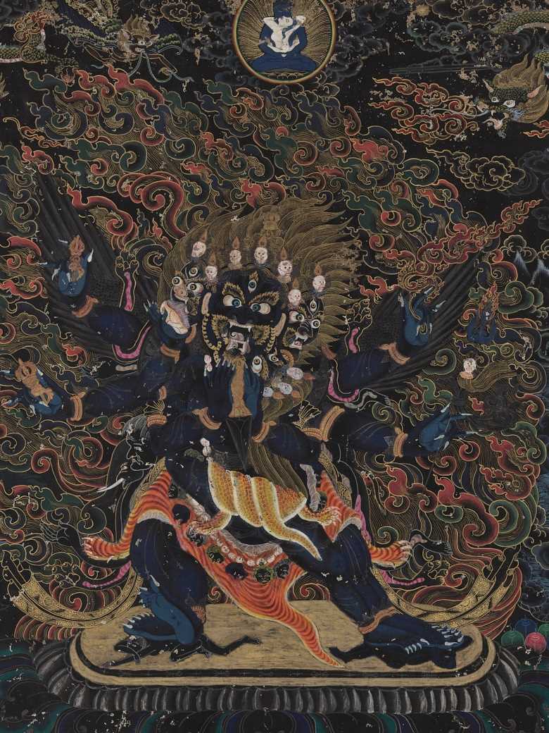 Lot 533 - A BLACK-GROUND THANGKA DEPICTING VAJRAKILA