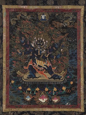 Lot 533 - A BLACK-GROUND THANGKA DEPICTING VAJRAKILA