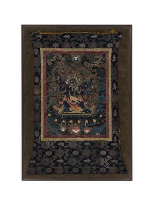 Lot 533 - A BLACK-GROUND THANGKA DEPICTING VAJRAKILA