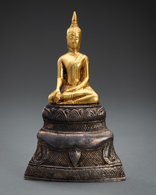 Lot 1423 - A THAI GOLD AND SILVER FOIL FIGURE OF BUDDHA SHAKYAMUNI, 19th CENTURY
