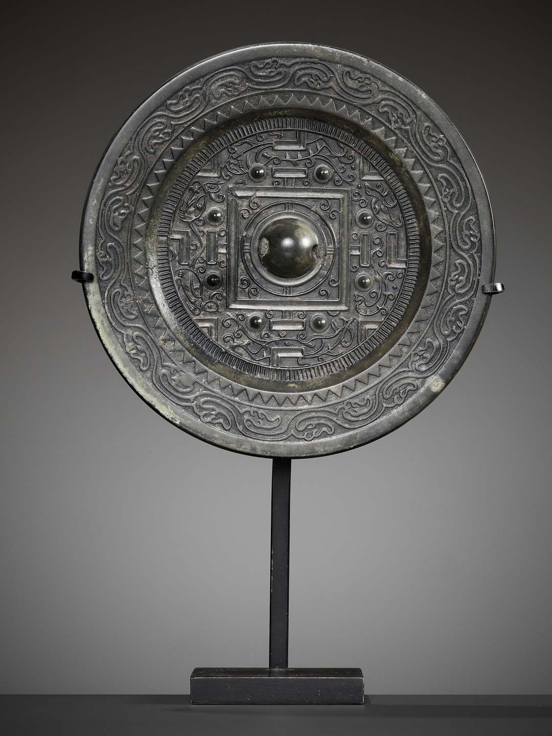 Lot 473 - A SILVERY BRONZE 'TLV' MIRROR, HAN DYNASTY