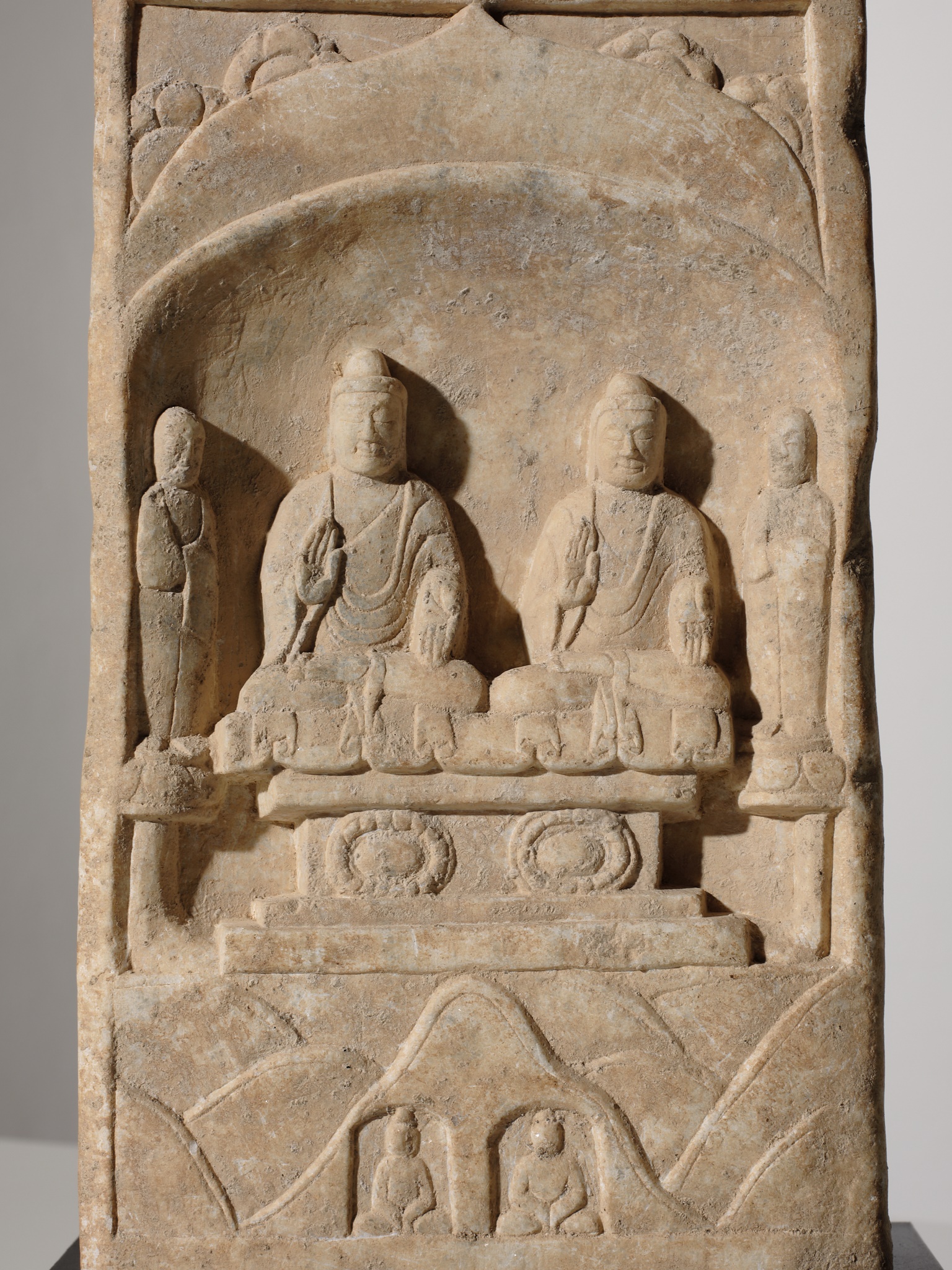 Lot 499 - A BUDDHIST STELE, FINELY CARVED FROM WHITE