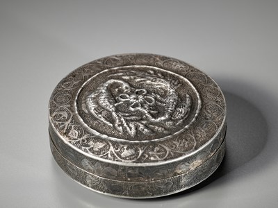 Lot 18 - A VERY RARE SILVER BOX AND COVER DEPICTING THE BLACK TORTOISE, XUANWU, TANG DYNASTY