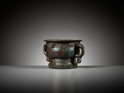 Lot 121 - A ‘FIRE AND FOUR-PETAL LEAVES’ BRONZE RITUAL FOOD VESSEL, GUI, EARLY WESTERN ZHOU DYNASTY