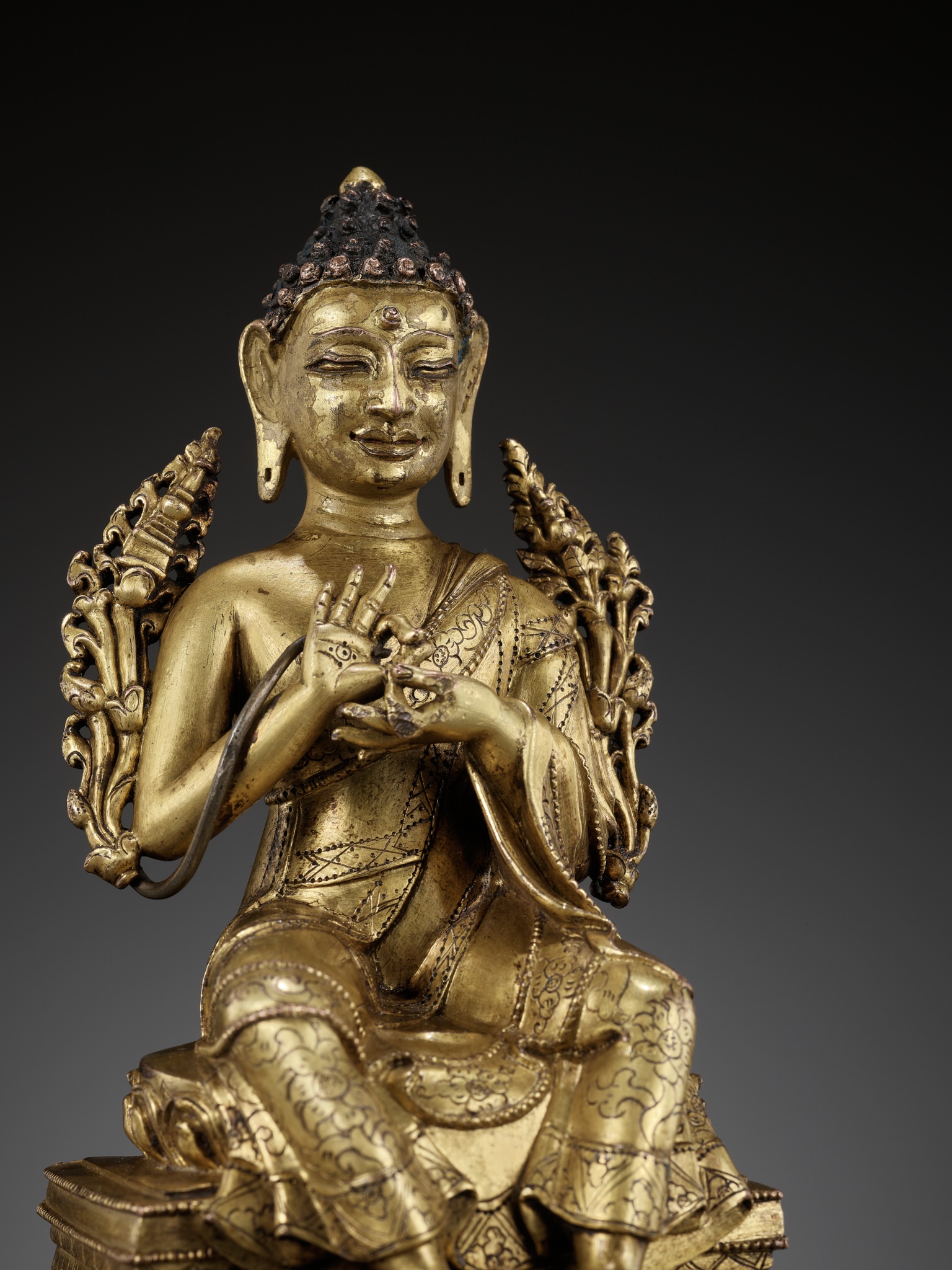 Lot 172 A MAGNIFICENT GILT BRONZE FIGURE OF MAITREYA,