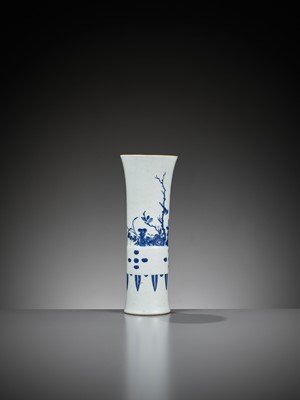 Lot 385 - A BLUE AND WHITE ‘MAGPIES AND PRUNUS’ BEAKER VASE, GU, TRANSITIONAL PERIOD