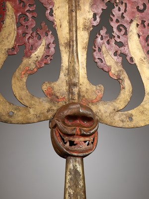 Lot 198 - A LARGE LACQUERED AND GILT COPPER-ALLOY TRISHULA FITTING, TIBET, 17TH - 18TH CENTURY
