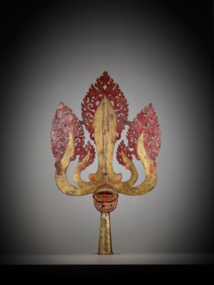 Lot 198 - A LARGE LACQUERED AND GILT COPPER-ALLOY TRISHULA FITTING, TIBET, 17TH - 18TH CENTURY