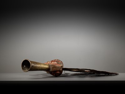 Lot 198 - A LARGE LACQUERED AND GILT COPPER-ALLOY TRISHULA FITTING, TIBET, 17TH - 18TH CENTURY