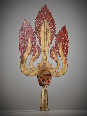 Lot 198 - A LARGE LACQUERED AND GILT COPPER-ALLOY TRISHULA FITTING, TIBET, 17TH - 18TH CENTURY